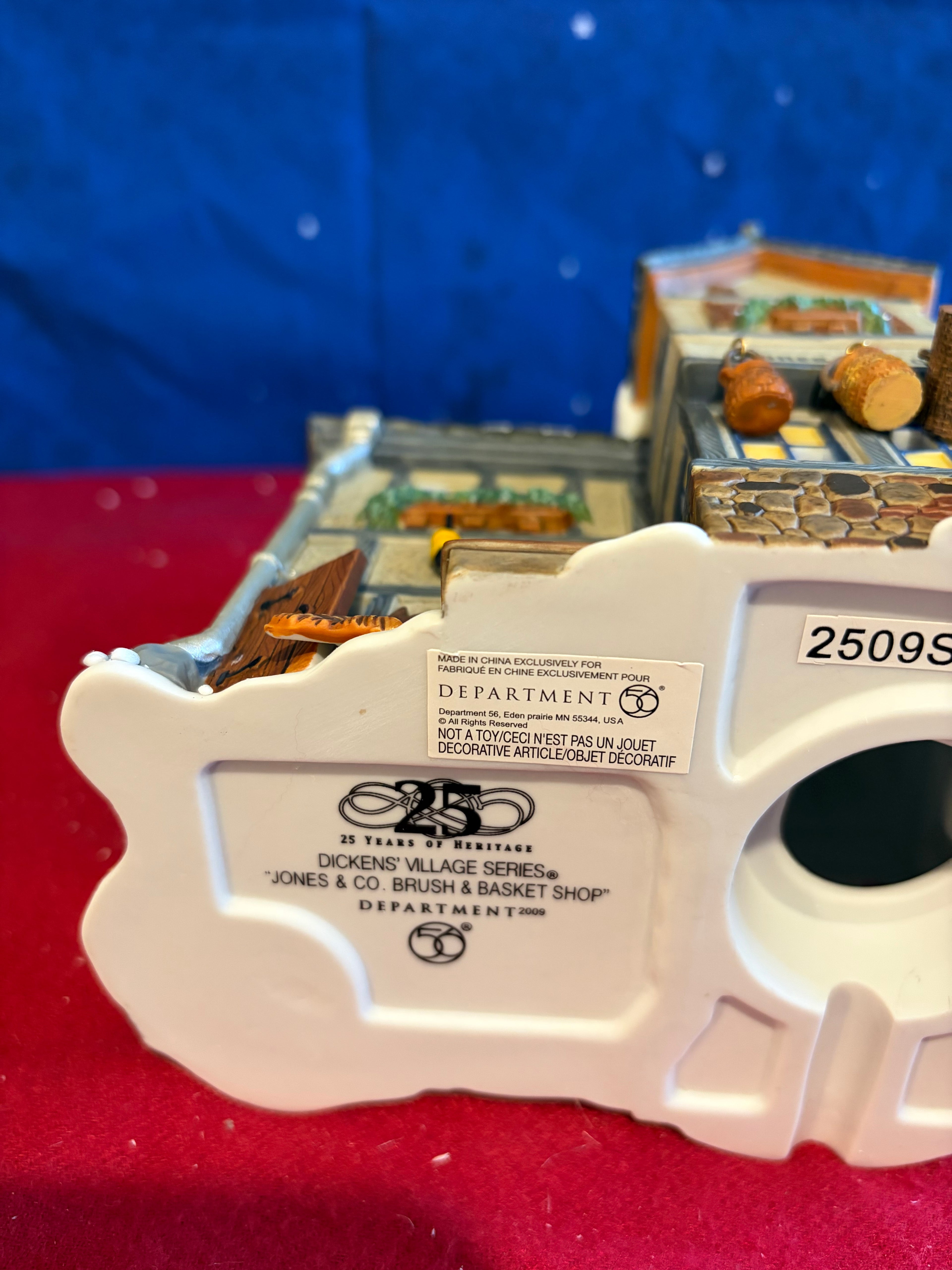 Dept 56 Jones & Co Brush & Basket Shop 25th Anniversary Edition